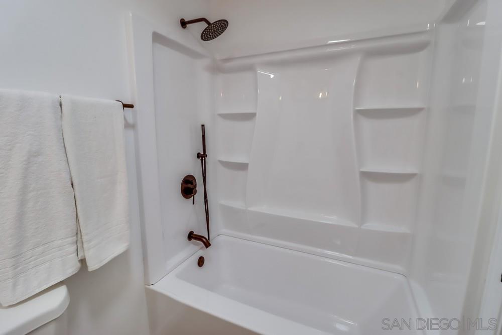 2821 Rosedale Way Spring Valley, CA 91977 - Photo 68 of 70 a bathroom with a bathtub