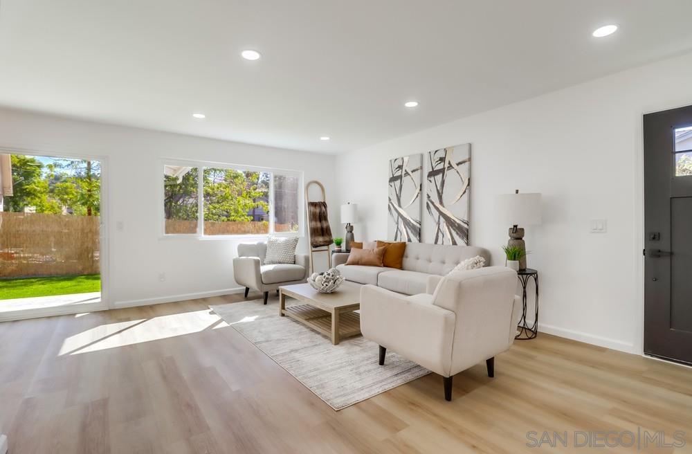 2821 Rosedale Way Spring Valley, CA 91977 - Photo 7 of 70 a living room with furniture and a flat screen tv