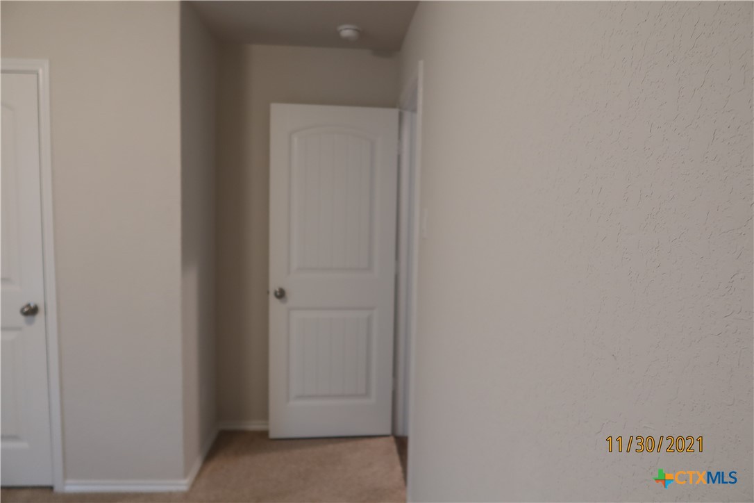 809 Margay Loop Seguin, TX 78155 - Photo 5 of 20 a view of a hallway