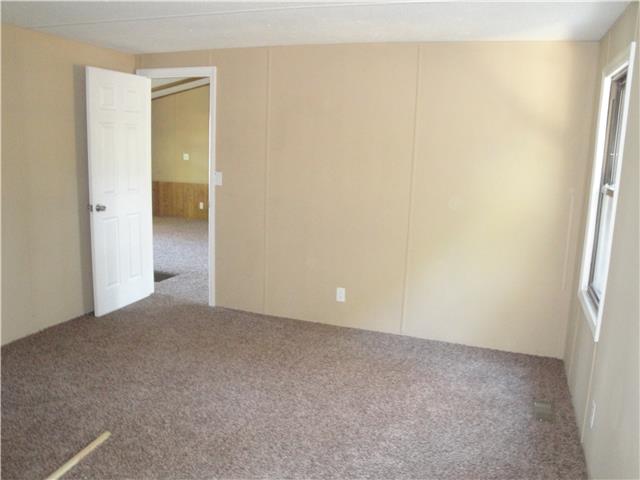 63 Jd Neil Road Tullahoma, TN 37388 - Photo 7 of 14 Master Bedroom w/ Full Bath