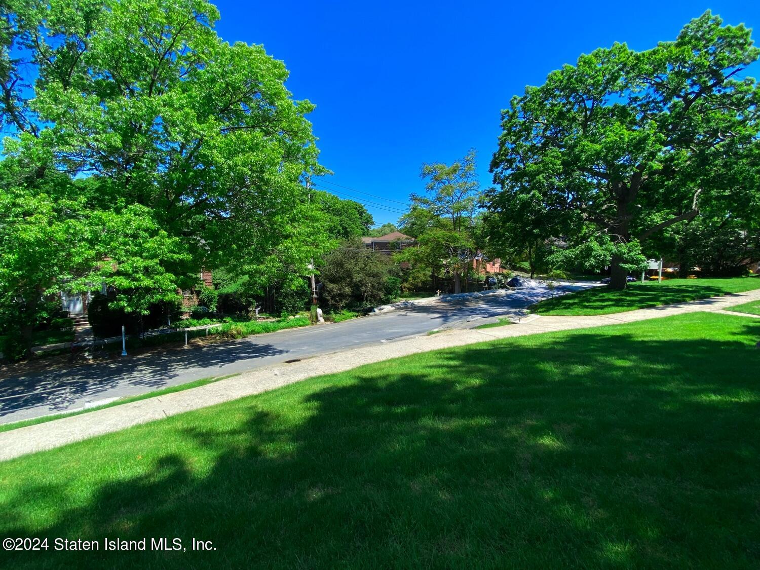166 Arlo Road, Unit A Staten Island, NY 10301 - Photo 20 of 21 a view of swimming pool with a yard