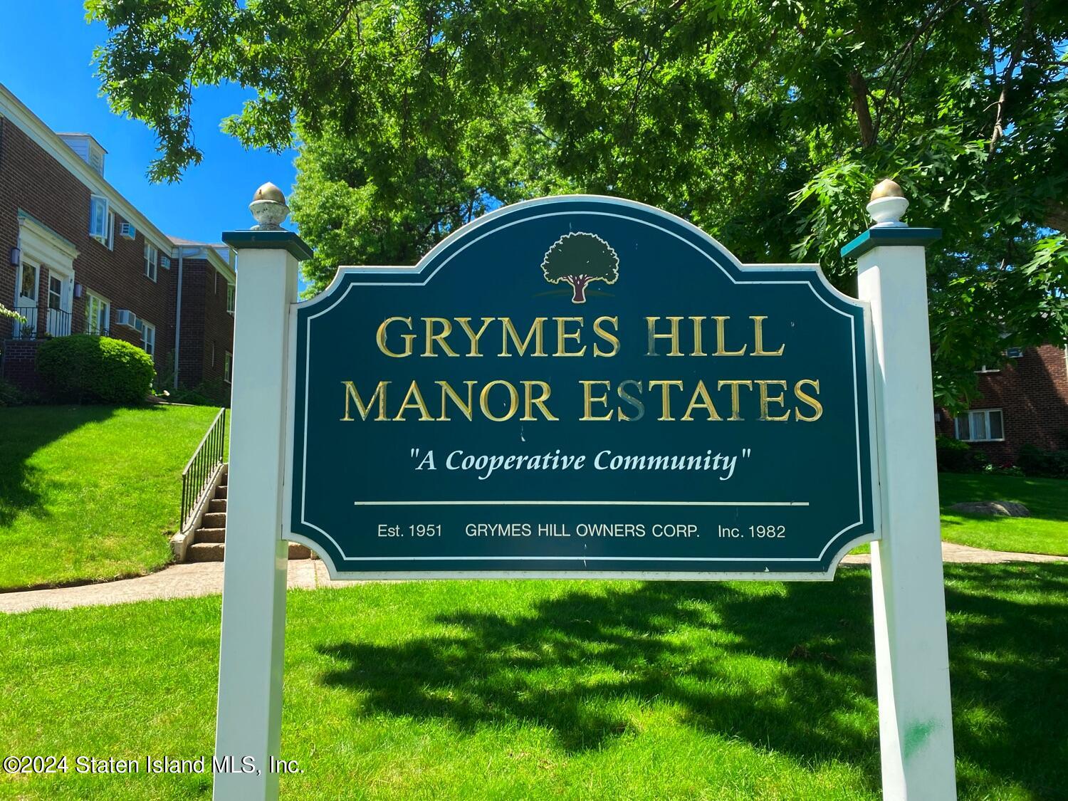 166 Arlo Road, Unit A Staten Island, NY 10301 - Photo 5 of 21 a sign on the side of the road
