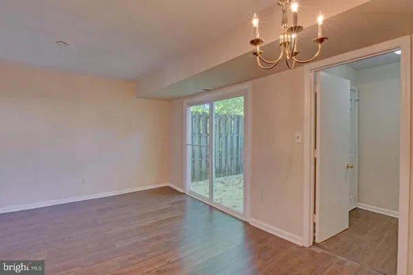 a view of livingroom with hardwood floor and window