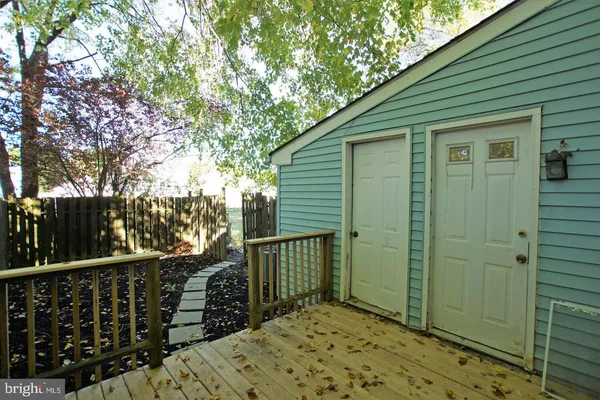 a view of a wooden house with a large window