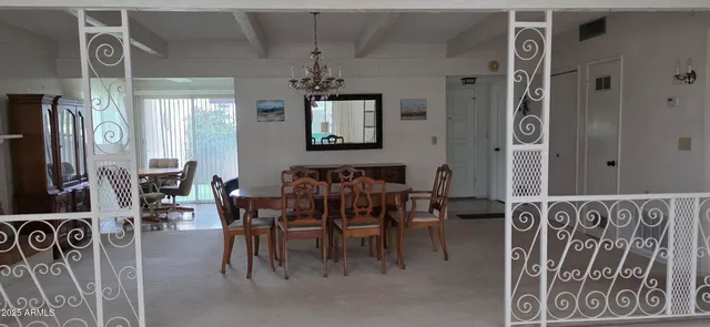 a view of a dining room with furniture