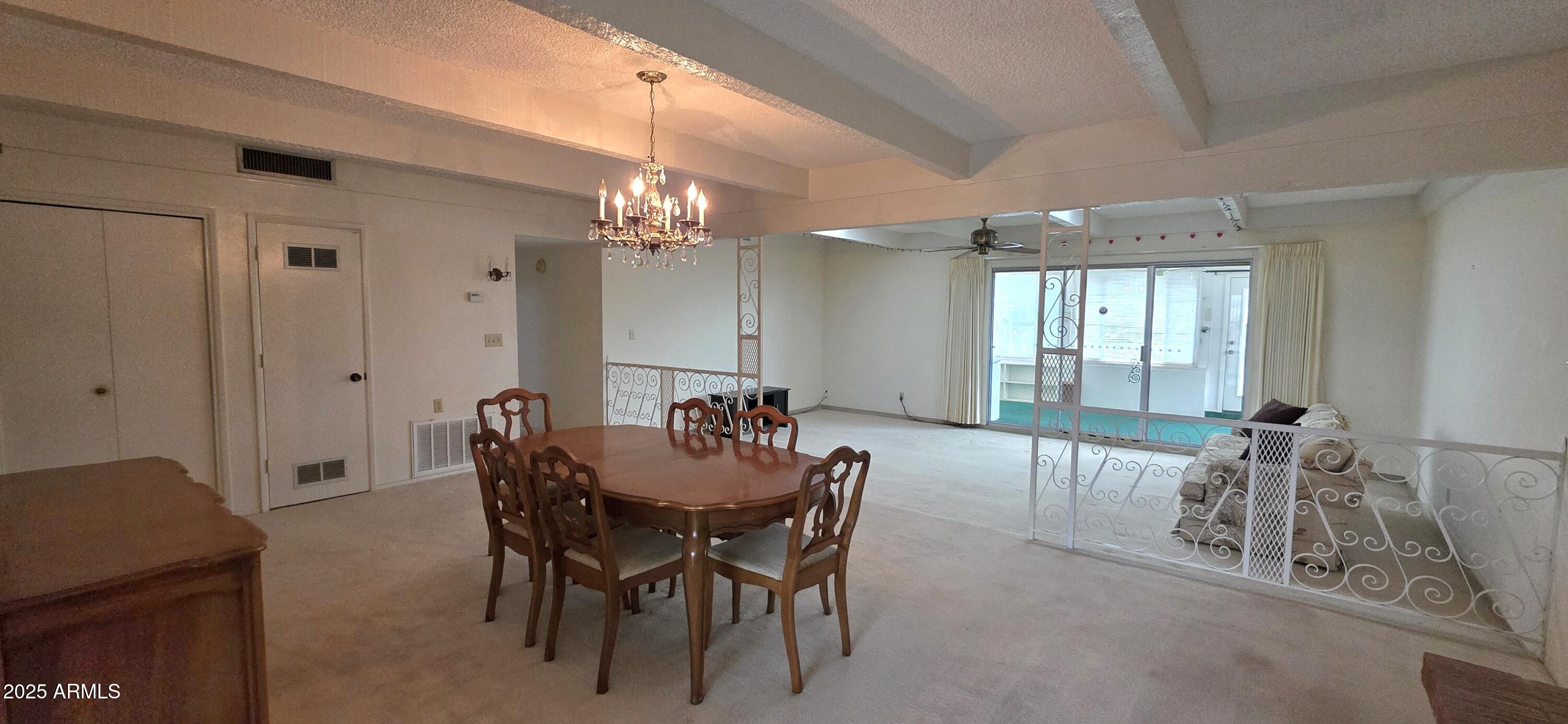 302 North Sage Street Pearce, AZ 85625 - Photo 12 of 38 a dining room with furniture and window