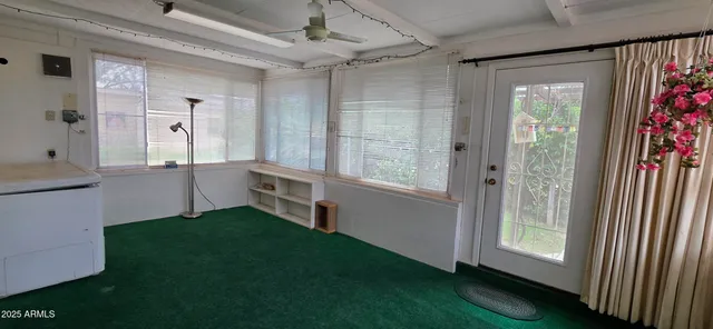 a view of an entryway with a livingroom