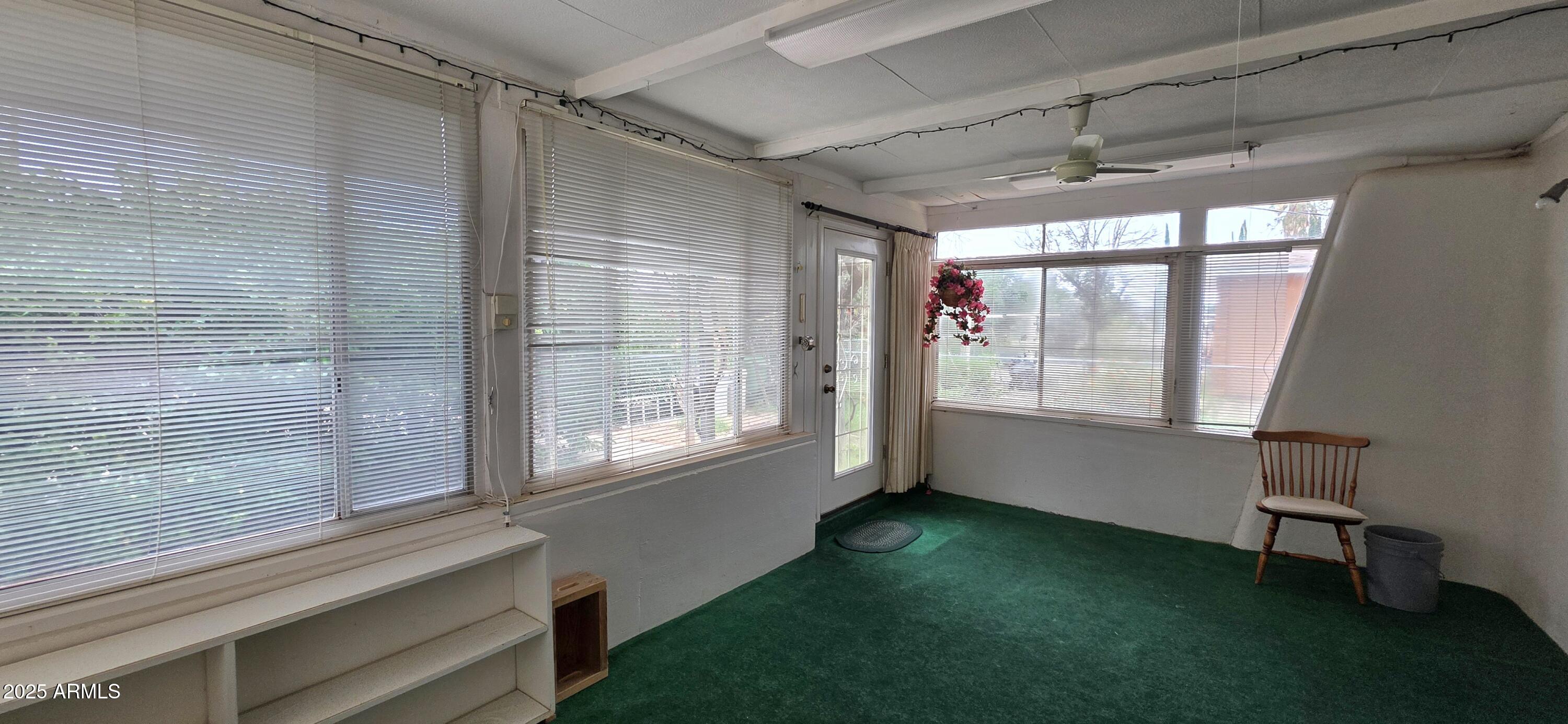 302 North Sage Street Pearce, AZ 85625 - Photo 17 of 38 a view of an empty room with a window
