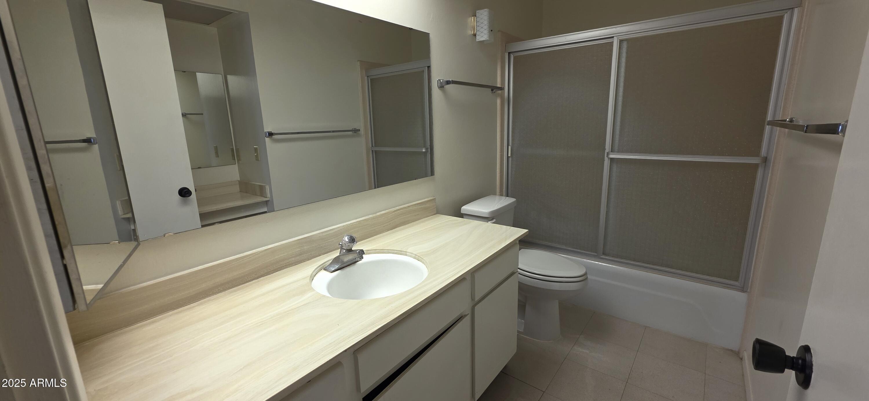 302 North Sage Street Pearce, AZ 85625 - Photo 22 of 38 a bathroom with a sink toilet and shower