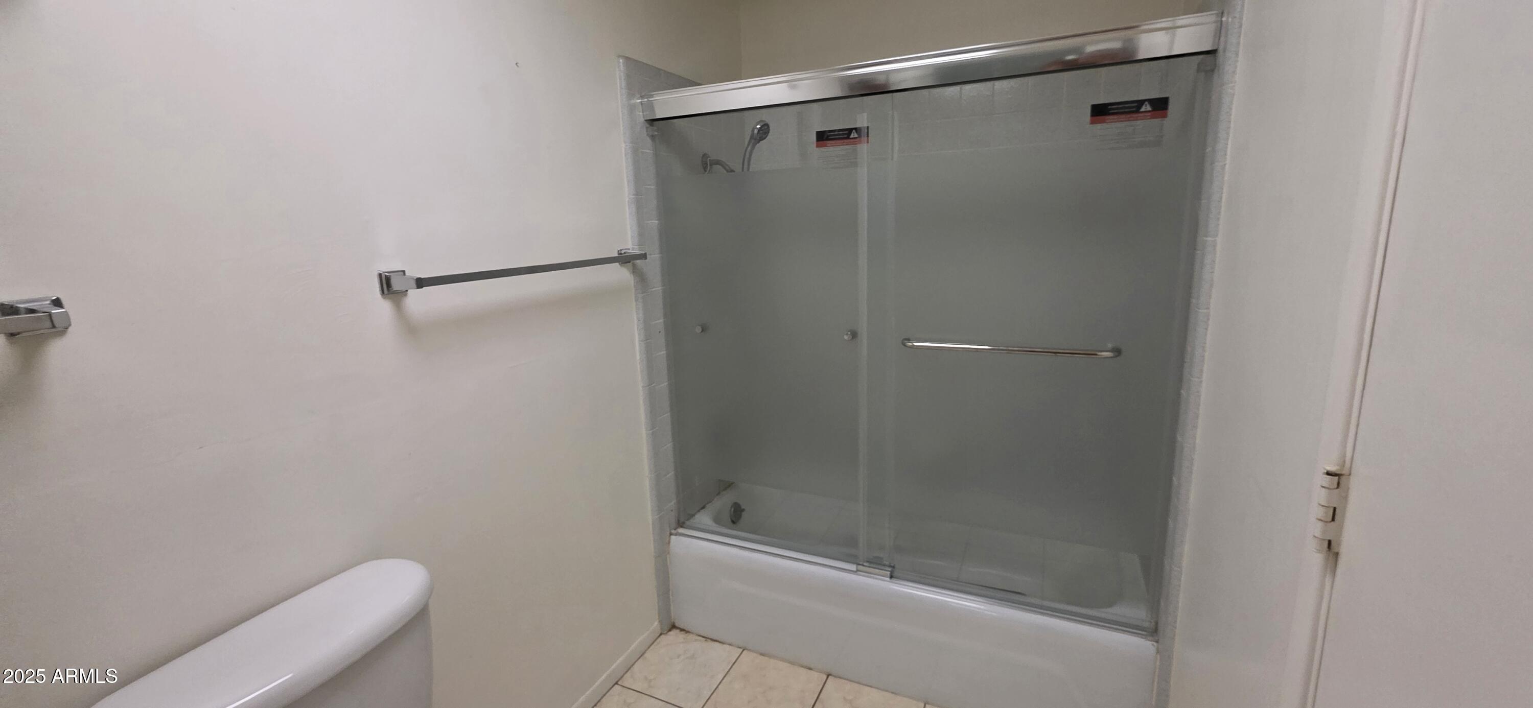 302 North Sage Street Pearce, AZ 85625 - Photo 26 of 38 a bathroom with a shower