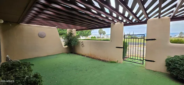 a view of porch with a garden
