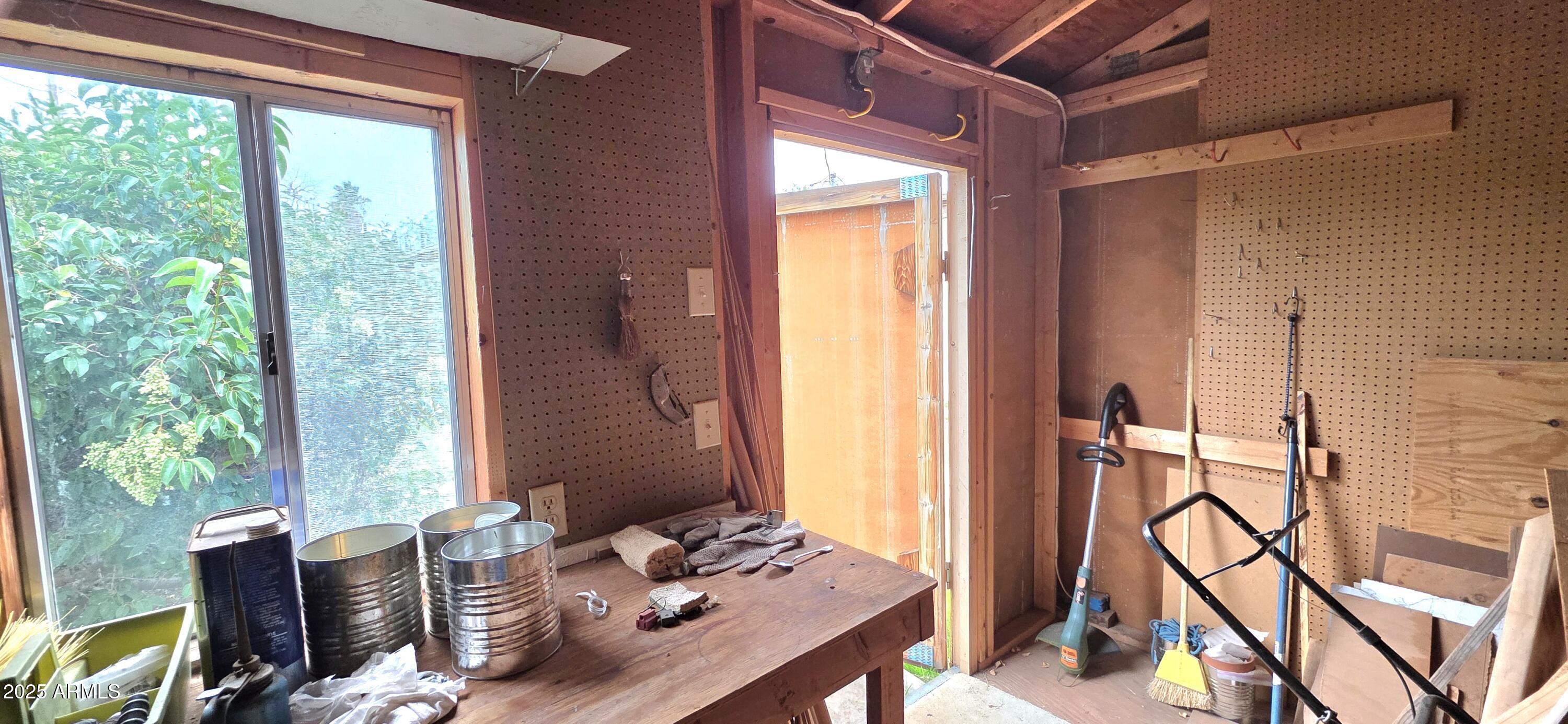 302 North Sage Street Pearce, AZ 85625 - Photo 34 of 38 a view of workspace with furniture and window