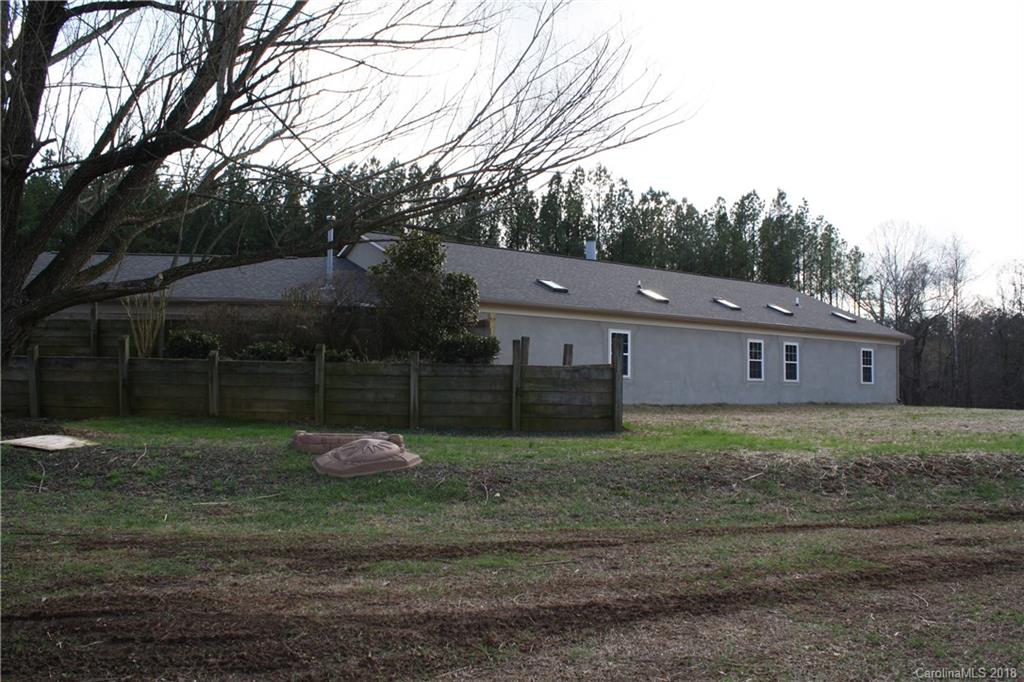 15850 Short Cut Road Gold Hill, NC 28071 - Photo 2 of 18 a backyard of a house