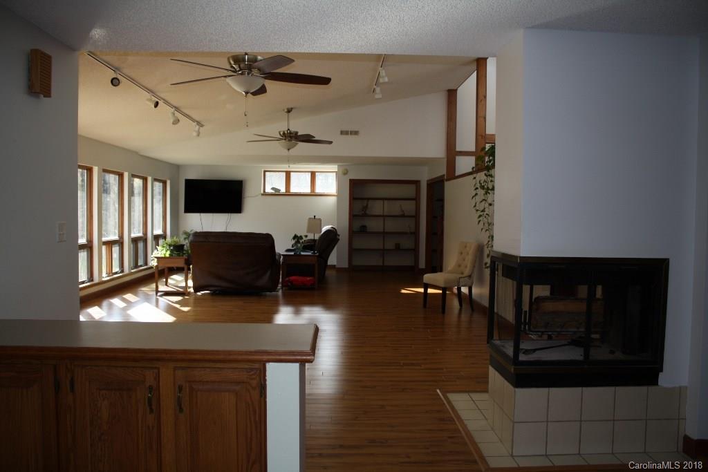 15850 Short Cut Road Gold Hill, NC 28071 - Photo 12 of 18 a living room with furniture and a fireplace