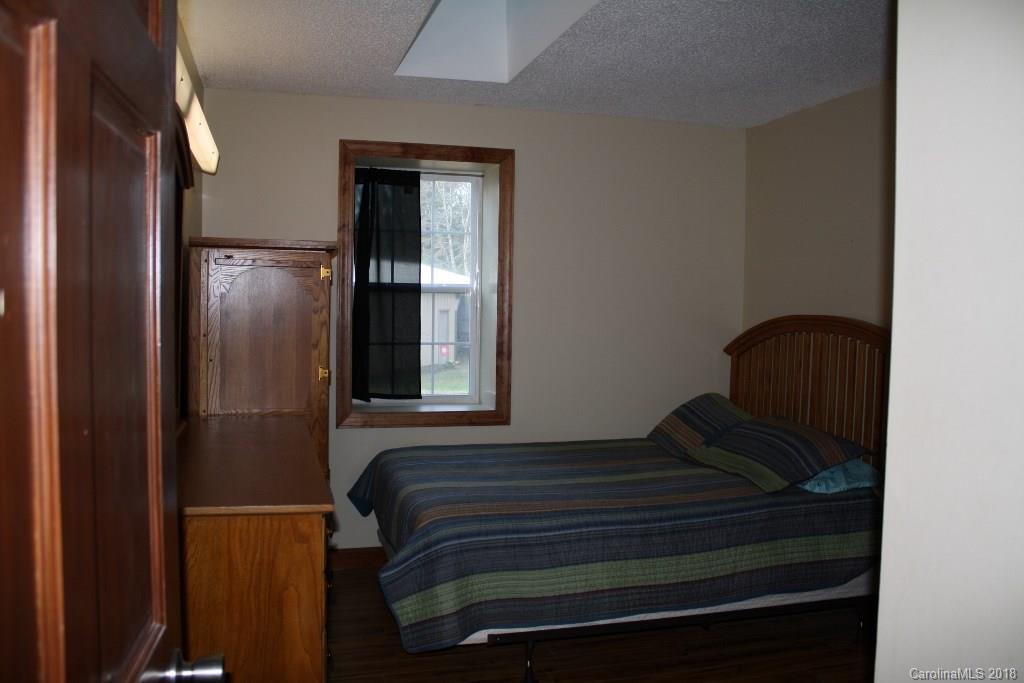 15850 Short Cut Road Gold Hill, NC 28071 - Photo 17 of 18 a bedroom with a bed and a dresser