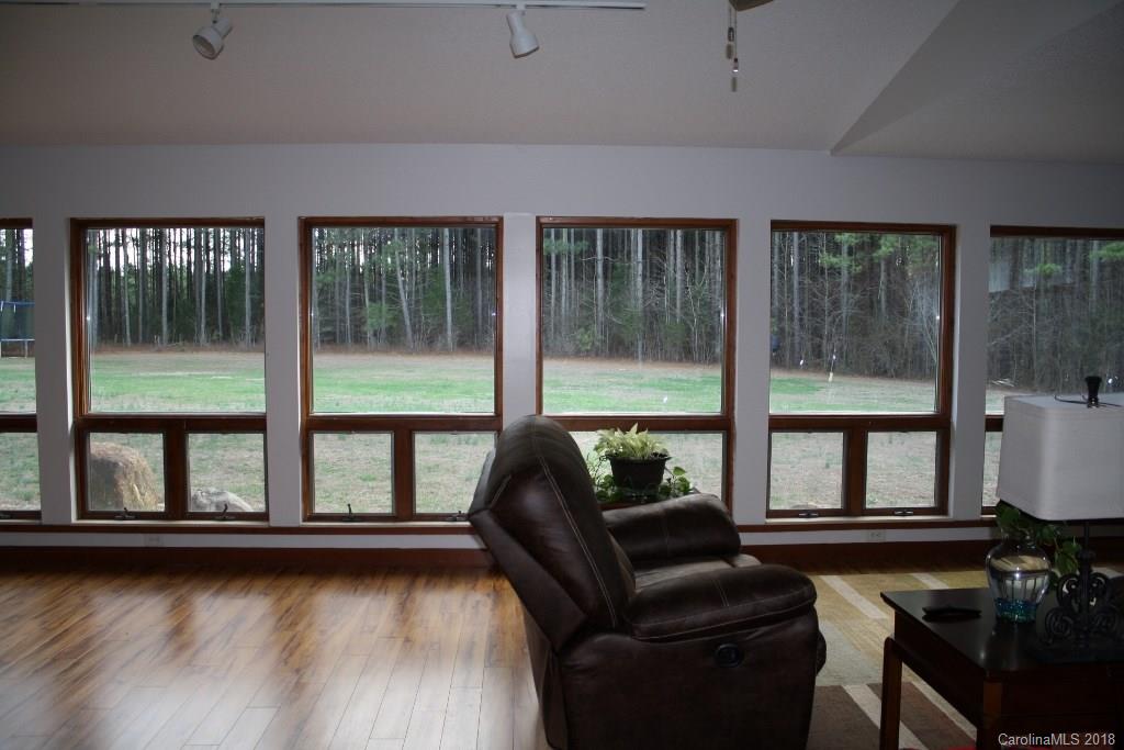 15850 Short Cut Road Gold Hill, NC 28071 - Photo 18 of 18 a living room with furniture and windows