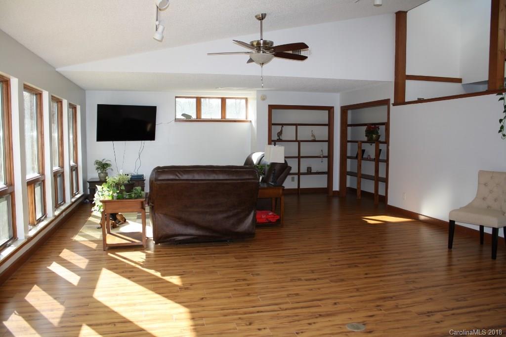 15850 Short Cut Road Gold Hill, NC 28071 - Photo 9 of 18 a living room with furniture and a flat screen tv