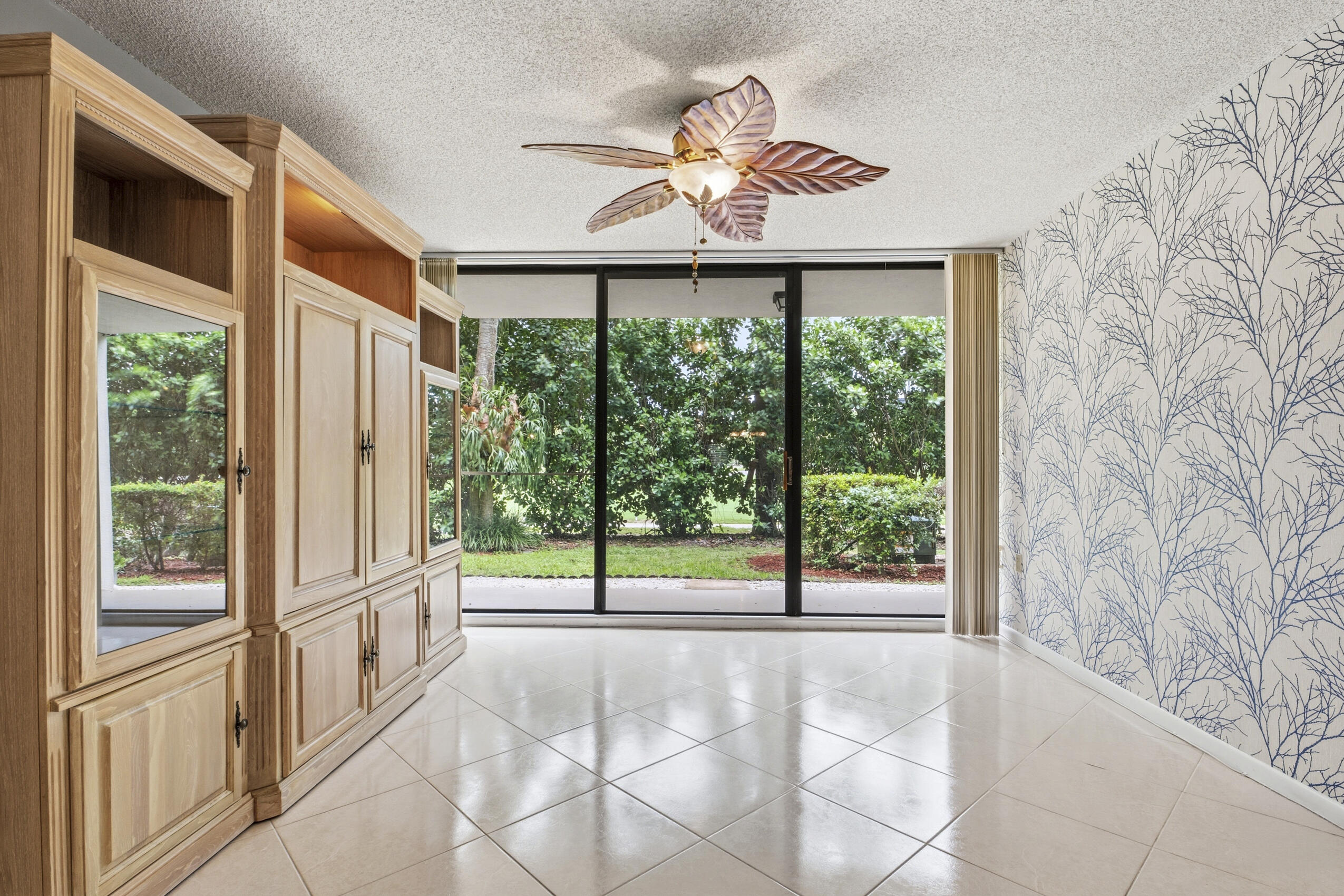6145 Balboa Circle, Unit 103 Boca Raton, FL 33433 - Photo 9 of 31 a view of an empty room with a window