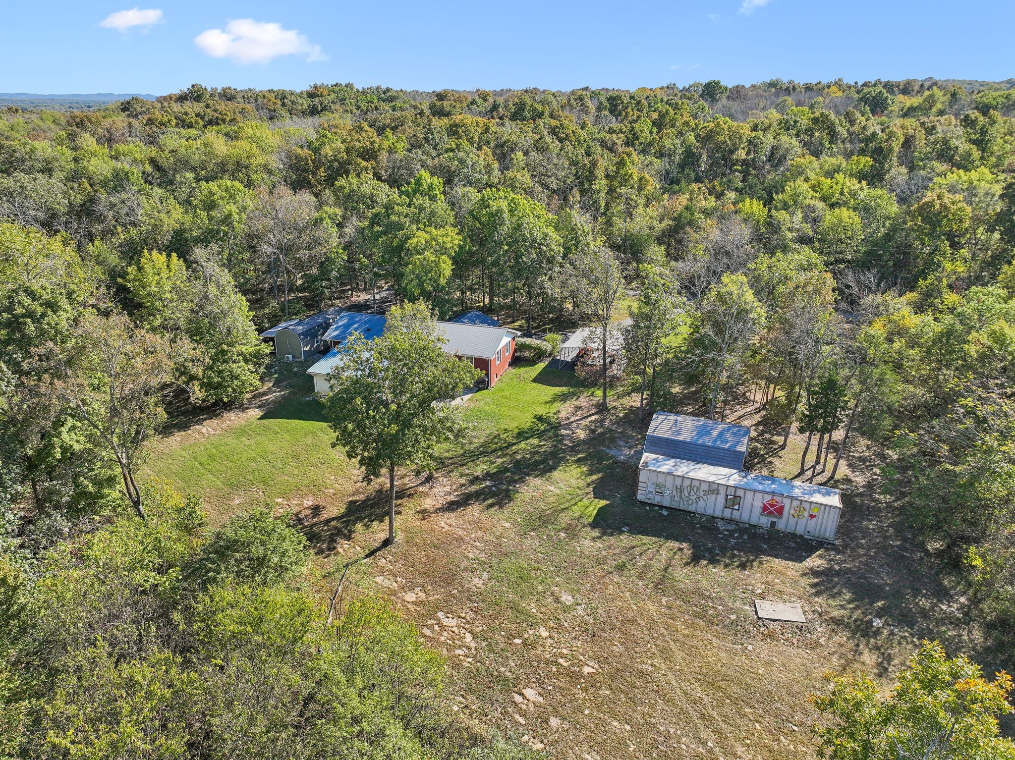 441 Scruggs Hollow Road Rockvale, TN 37153 - Photo 2 of 44 This property boasts 10 acres of stunning wooded land, providing a picturesque and tranquil setting for outdoor enthusiasts and nature lovers. 441 Scruggs Hollow Rd Rockvale, TN 37153