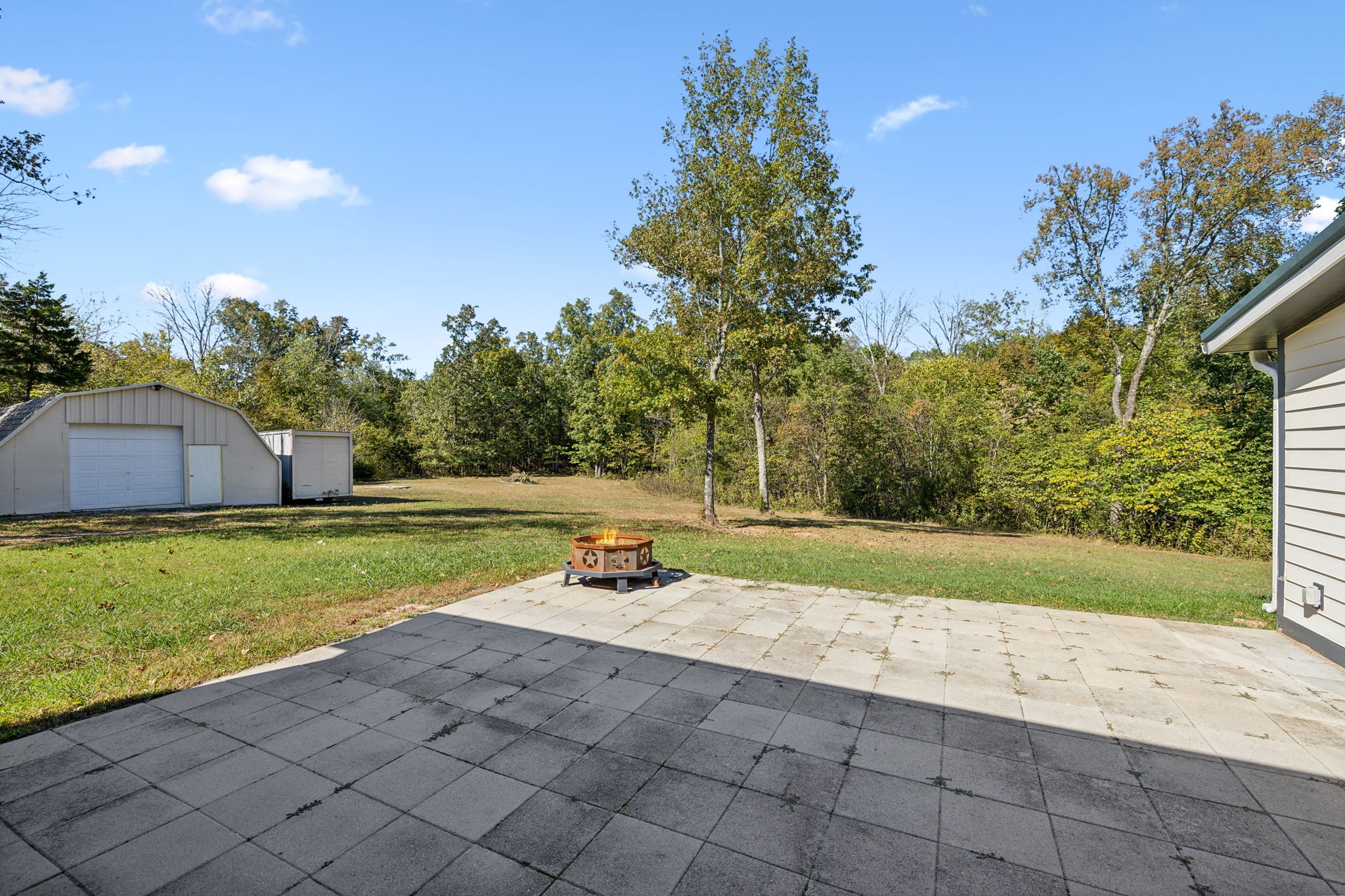 441 Scruggs Hollow Road Rockvale, TN 37153 - Photo 25 of 44 The large patio is perfect for hosting BBQs and gatherings, providing ample space for entertaining friends and family! 441 Scruggs Hollow Rd Rockvale, TN 37153
