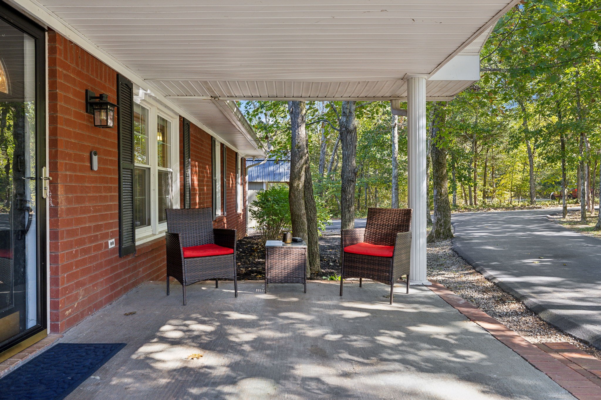 441 Scruggs Hollow Road Rockvale, TN 37153 - Photo 4 of 44 A large covered patio enhances the space, offering a perfect spot for tranquil mornings that feel like a dream! 441 Scruggs Hollow Rd Rockvale, TN 37153