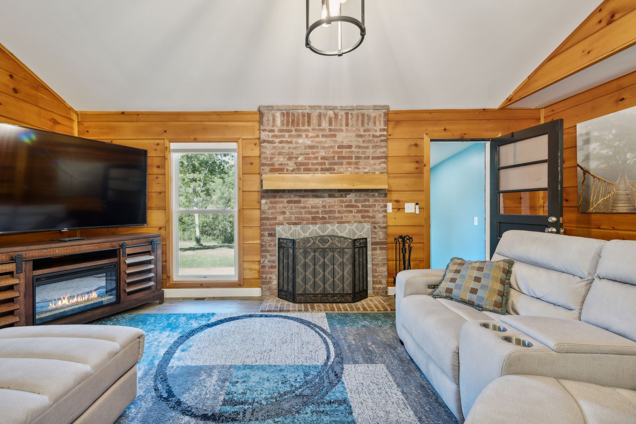 441 Scruggs Hollow Road Rockvale, TN 37153 - Photo 6 of 44 Stylish wooden feature walls enhance the ambiance, creating a rustic yet inviting atmosphere! 441 Scruggs Hollow Rd Rockvale, TN 37153
