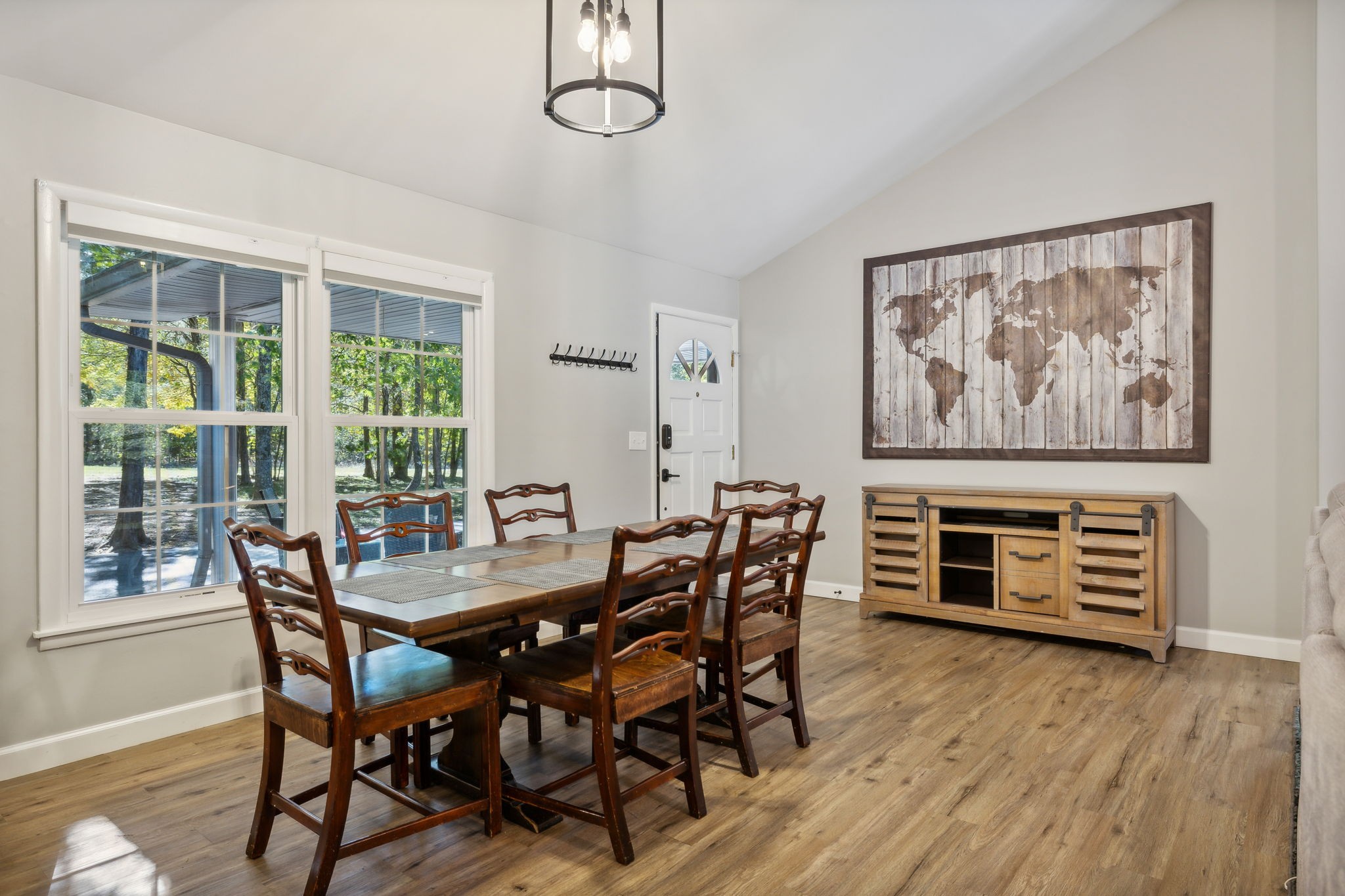 441 Scruggs Hollow Road Rockvale, TN 37153 - Photo 8 of 44 The eat-in area features large windows that fill the space with natural light, complemented by a modern fixture and ample room for a large dining table. 441 Scruggs Hollow Rd Rockvale, TN 37153