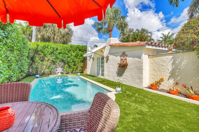 a view of balcony with a yard