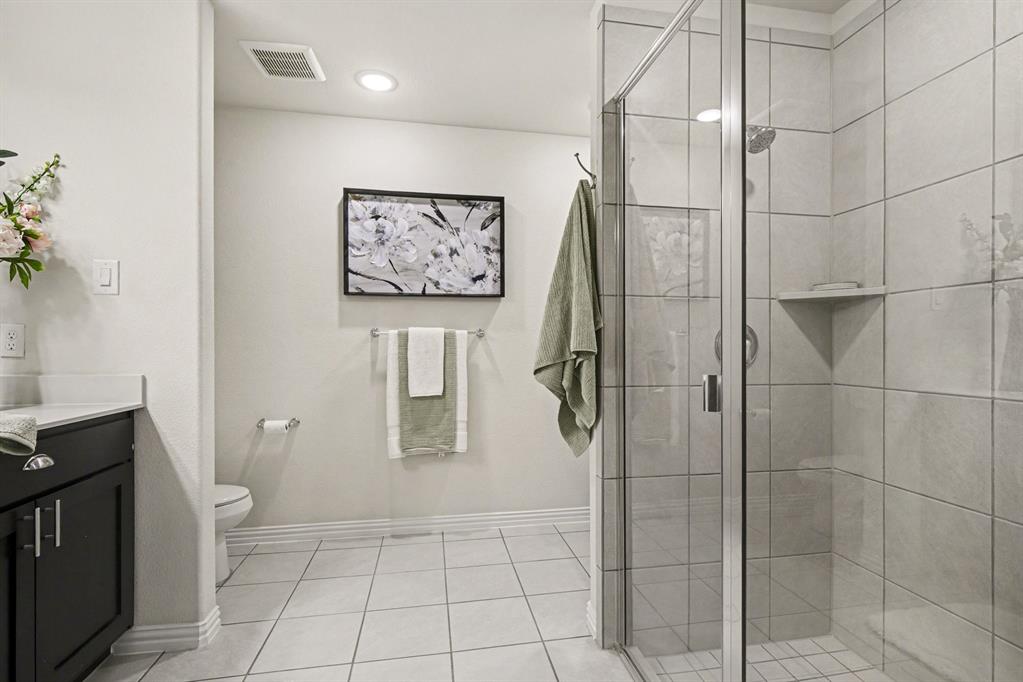 1237 Rushmore Drive Burleson, TX 76028 - Photo 14 of 28 a bathroom with a shower