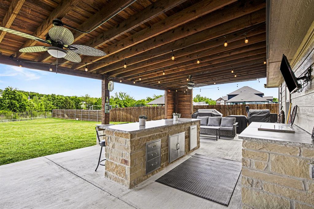 1237 Rushmore Drive Burleson, TX 76028 - Photo 20 of 28 a view of a backyard with sitting area