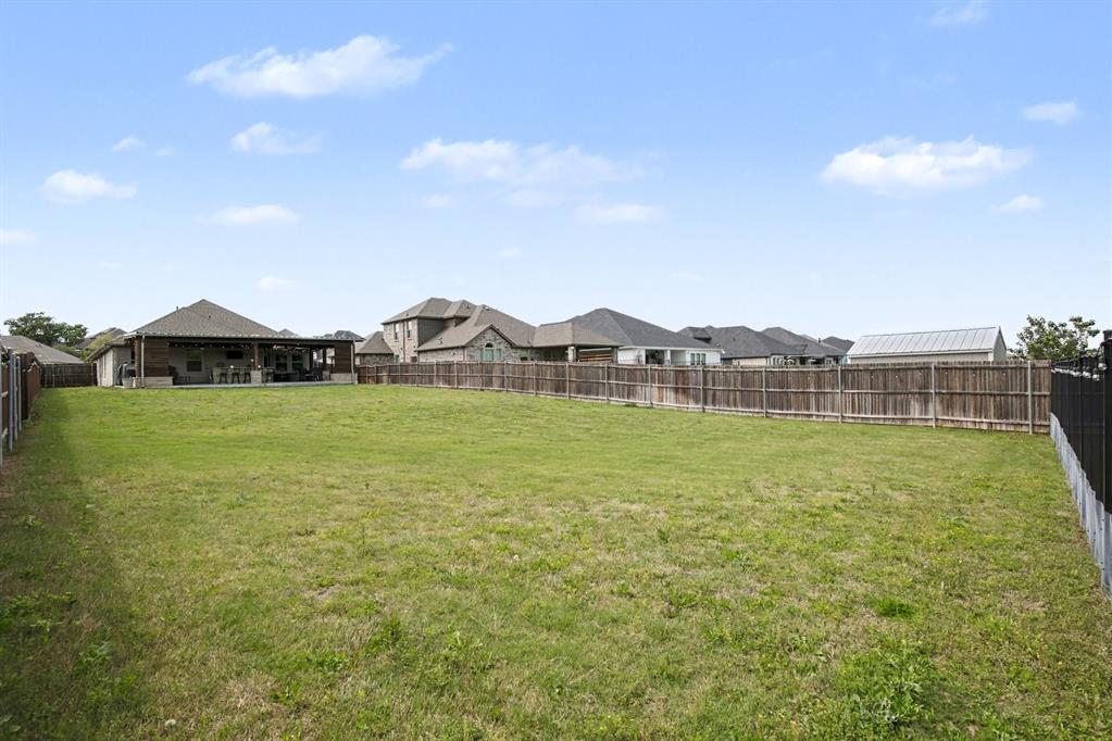1237 Rushmore Drive Burleson, TX 76028 - Photo 26 of 28 a view of a house with yard and balcony