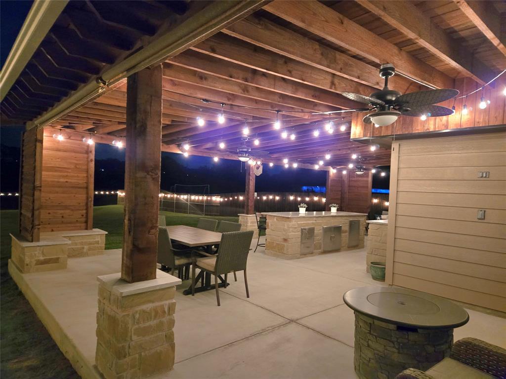 1237 Rushmore Drive Burleson, TX 76028 - Photo 27 of 28 a outdoor space with patio lots of white furniture