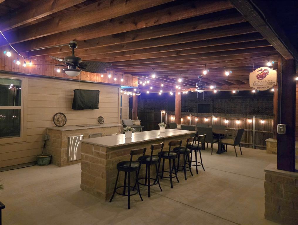 1237 Rushmore Drive Burleson, TX 76028 - Photo 28 of 28 a view of a room with furniture and a projector screen