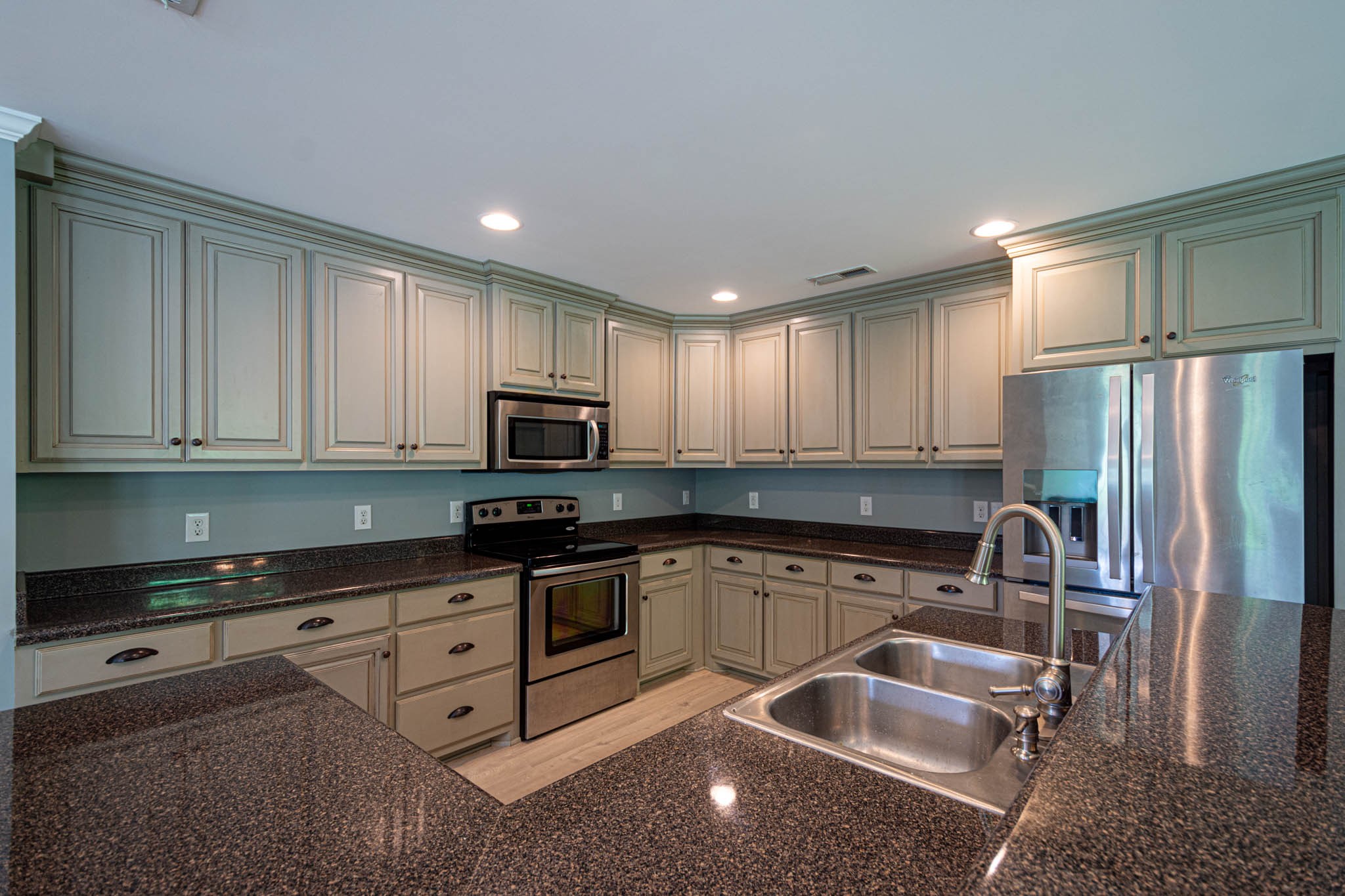 901 Cedar Pl Road Pulaski, TN 38478 - Photo 12 of 59 a kitchen with granite countertop a sink stainless steel appliances and cabinets