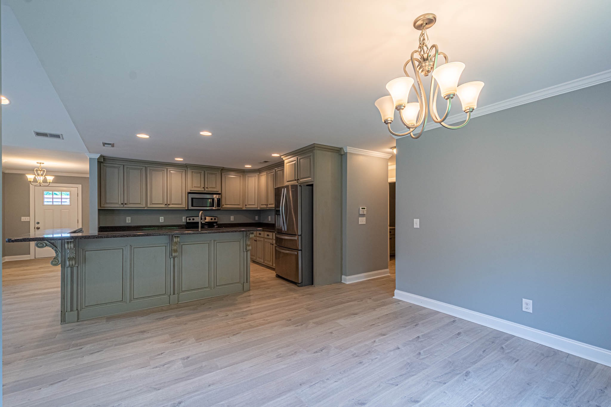 901 Cedar Pl Road Pulaski, TN 38478 - Photo 18 of 59 a kitchen with stainless steel appliances granite countertop a refrigerator and a stove top oven