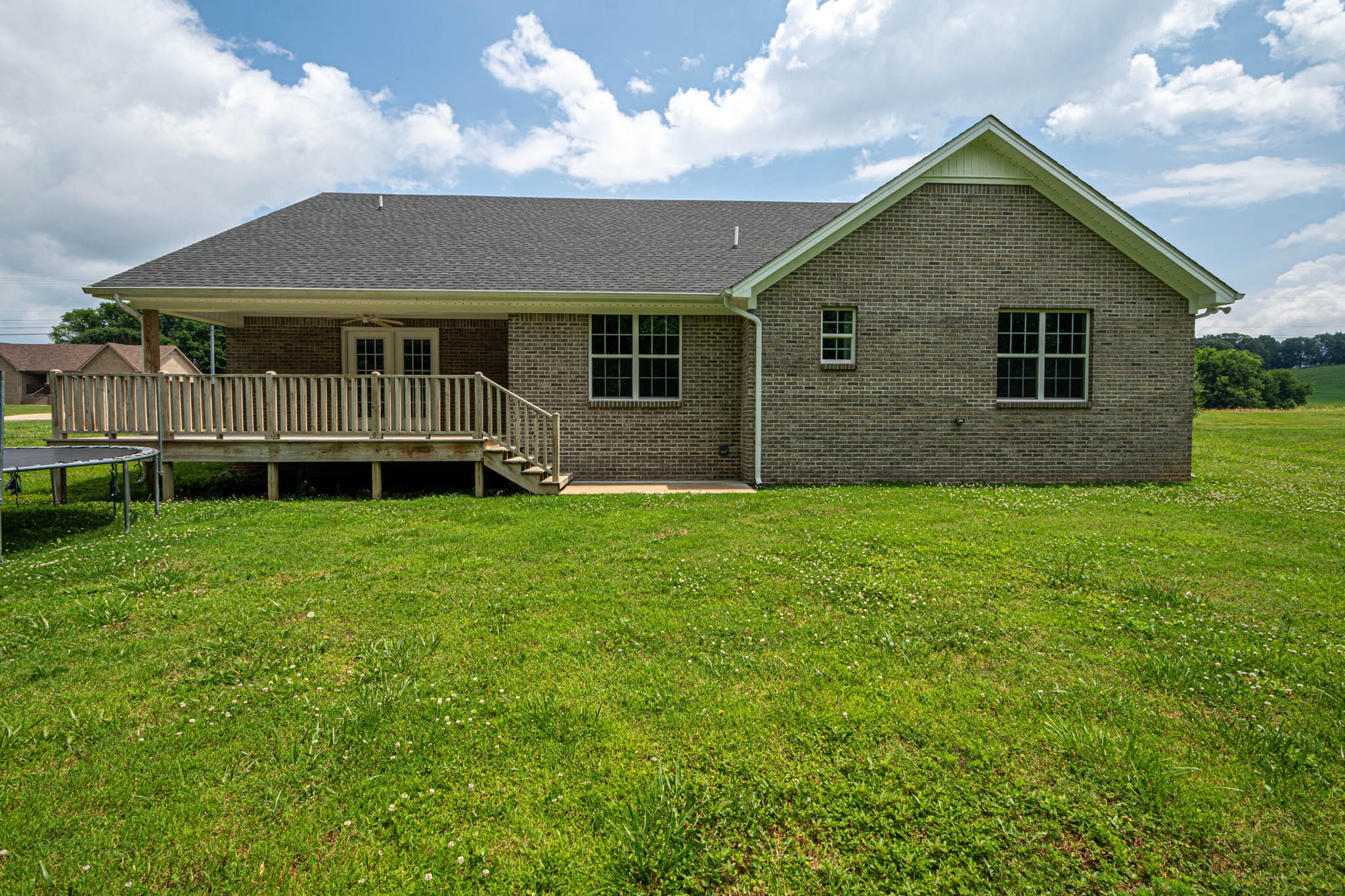 901 Cedar Pl Road Pulaski, TN 38478 - Photo 54 of 59 a front view of a house with a yard and trees