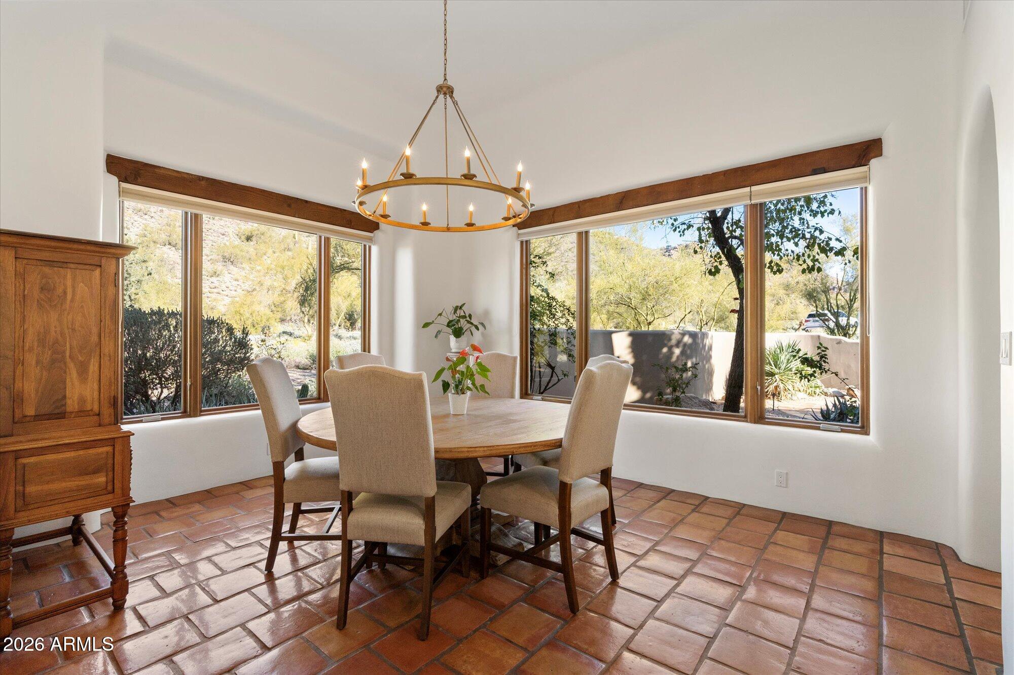 34815 North Arroyo Road Carefree, AZ 85377 - Photo 15 of 60 a view of a dining room with furniture window and outside view
