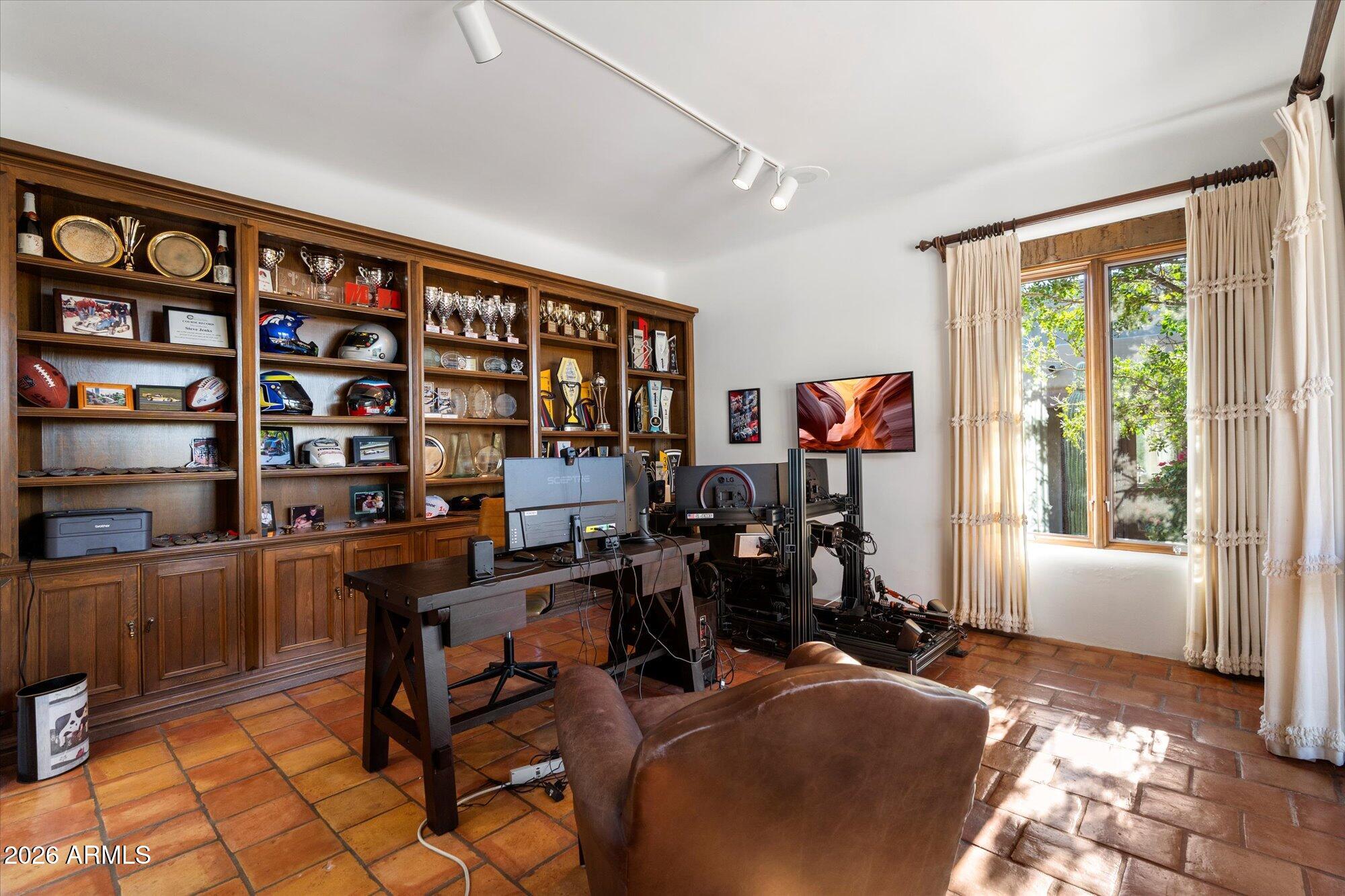 34815 North Arroyo Road Carefree, AZ 85377 - Photo 28 of 60 a view of a workspace with furniture and a window