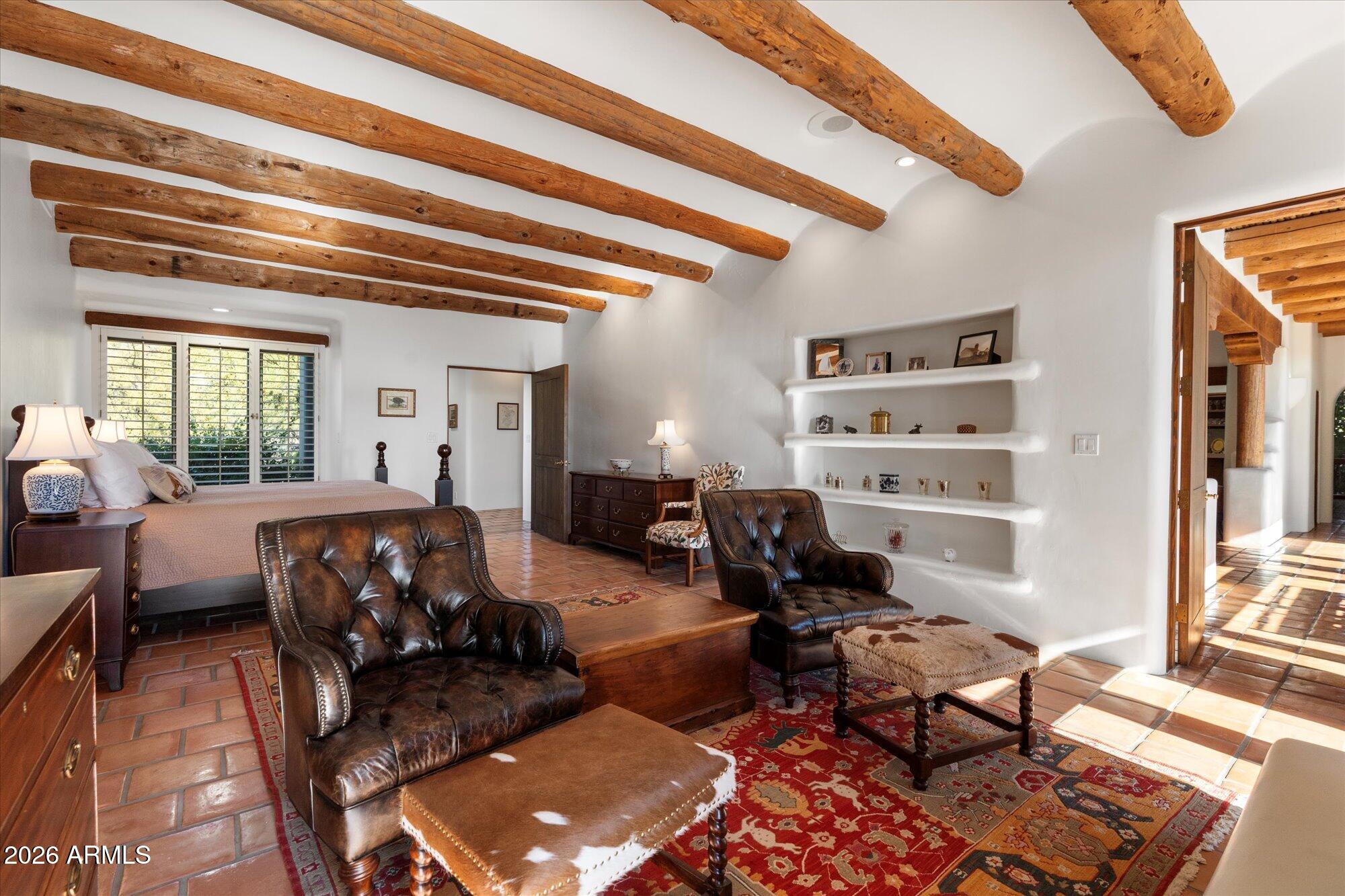 34815 North Arroyo Road Carefree, AZ 85377 - Photo 35 of 60 a living room with furniture a rug and a window