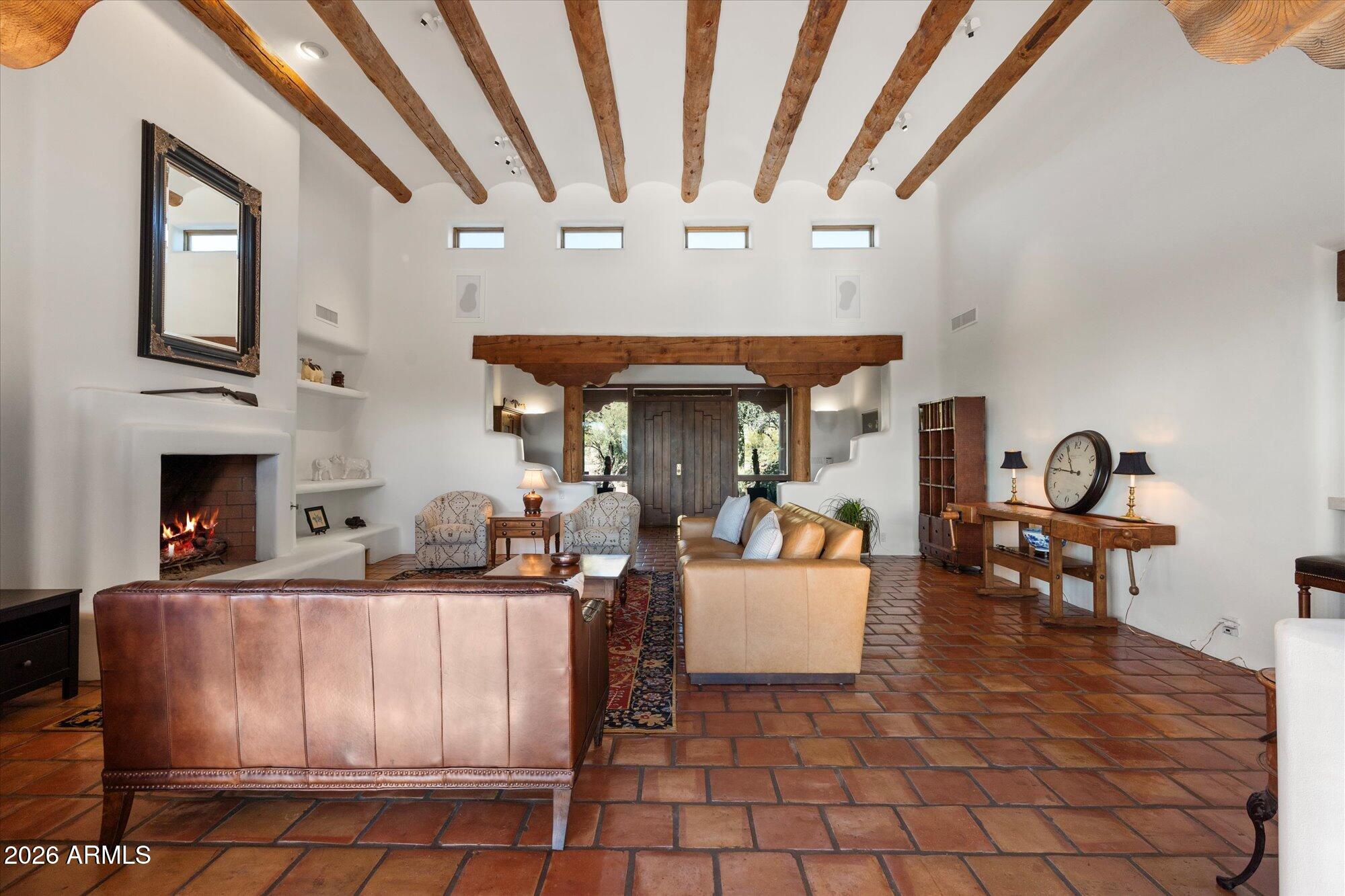 34815 North Arroyo Road Carefree, AZ 85377 - Photo 10 of 60 a living room with fireplace furniture and a potted plant