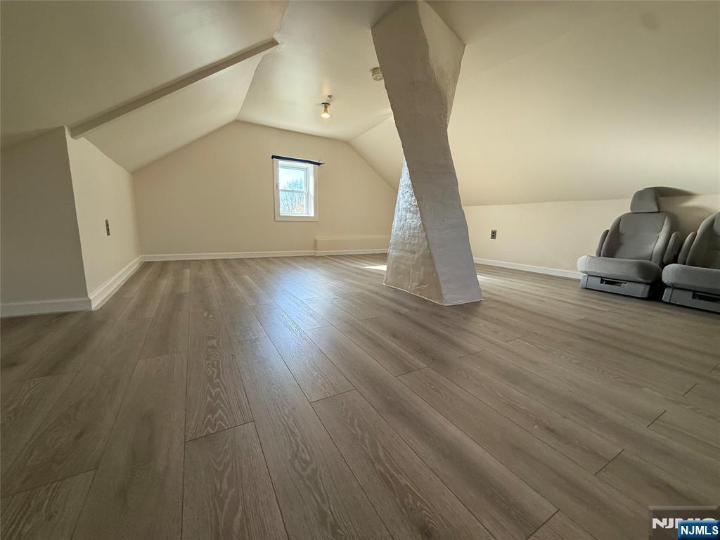 88 Main Street Little Ferry, NJ 07643 - Photo 24 of 32 a view of an empty room and wooden floor