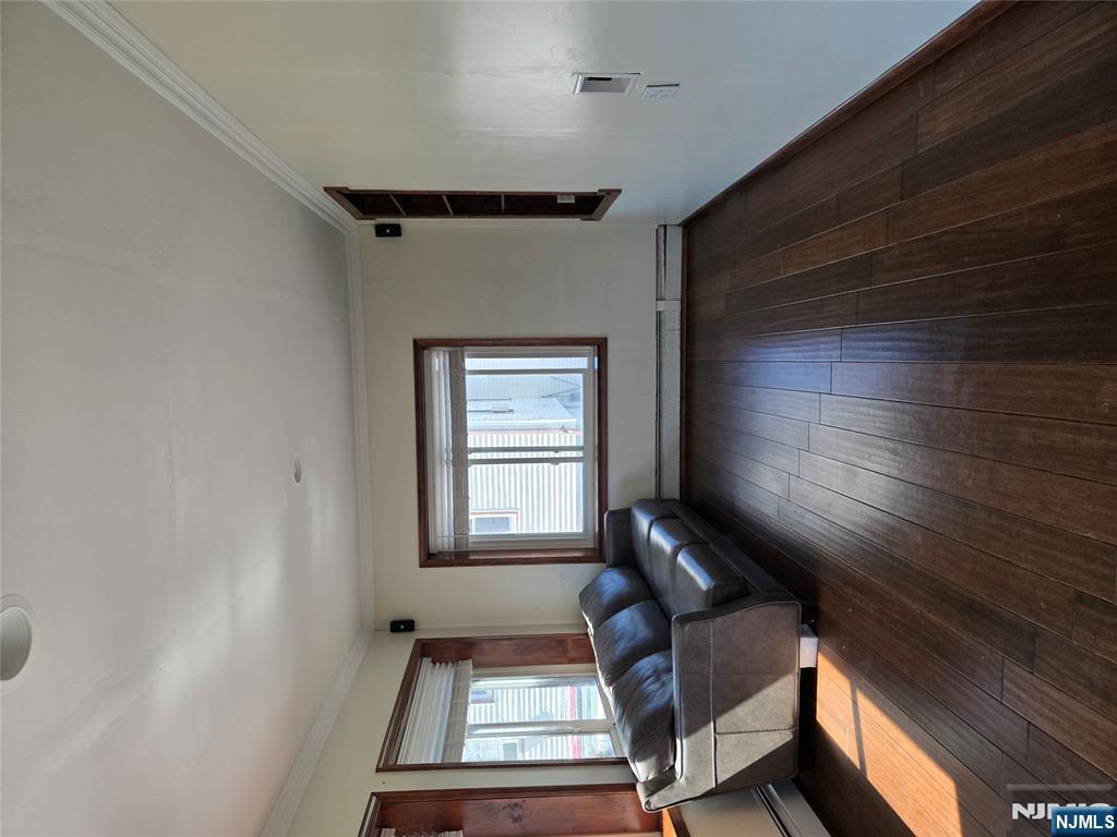 88 Main Street Little Ferry, NJ 07643 - Photo 4 of 32 a living room with couch and wooden floor