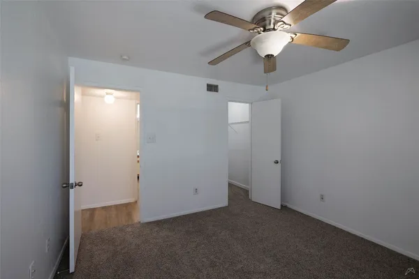 a view of small space with racks on the wall