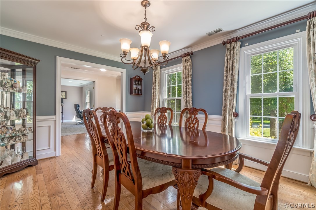 14912 Walnut Bend Road Midlothian, VA 23112 - Photo 7 of 41 a view of a dining room with furniture window and outside view