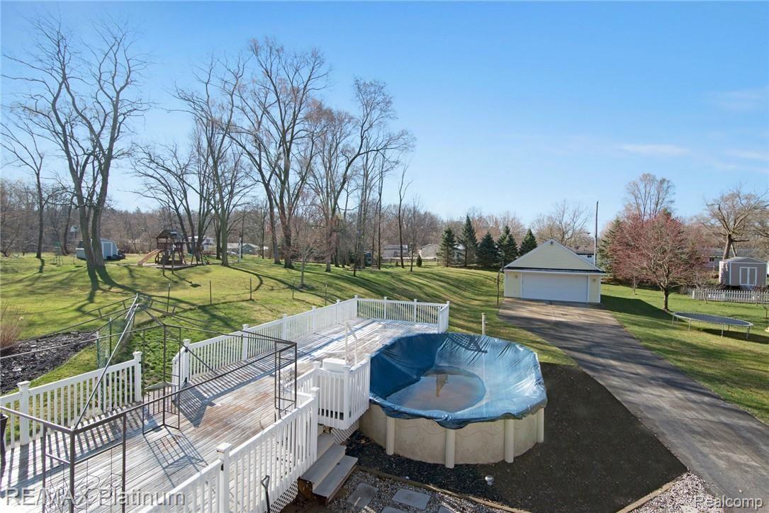 629 Brighton Lake Road Brighton, MI 48116 - Photo 41 of 45 Cabana and pool deck