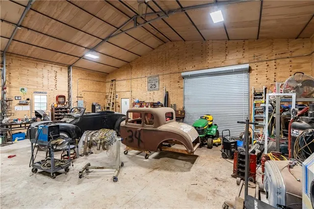 a view of a backyard with large trees