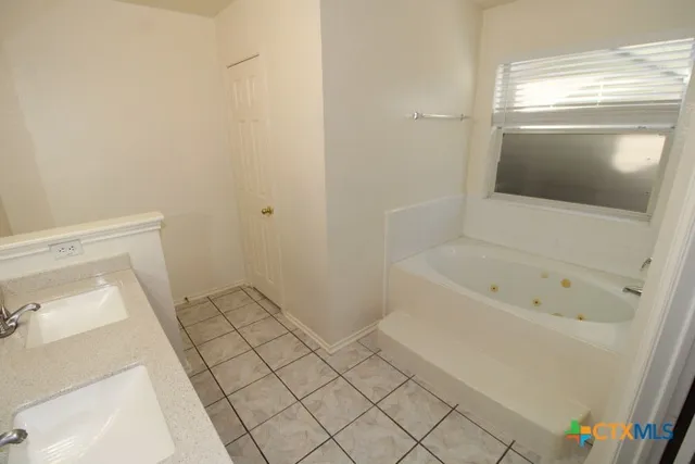 a bathroom with a bathtub