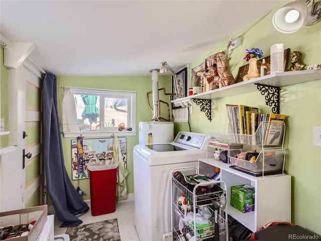 a storage room with washer and dryer