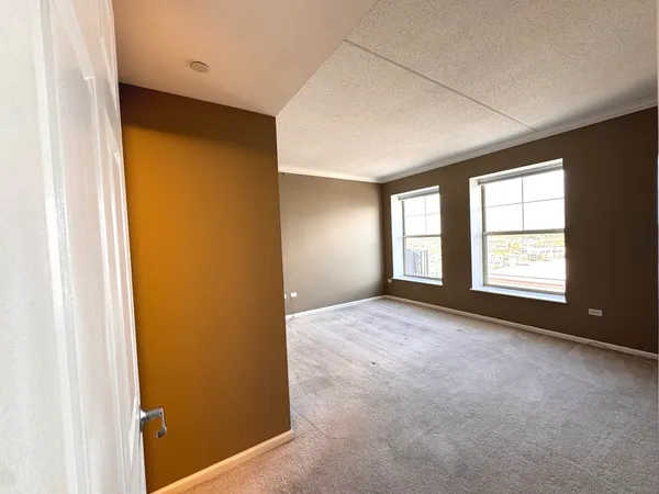 an empty room with windows