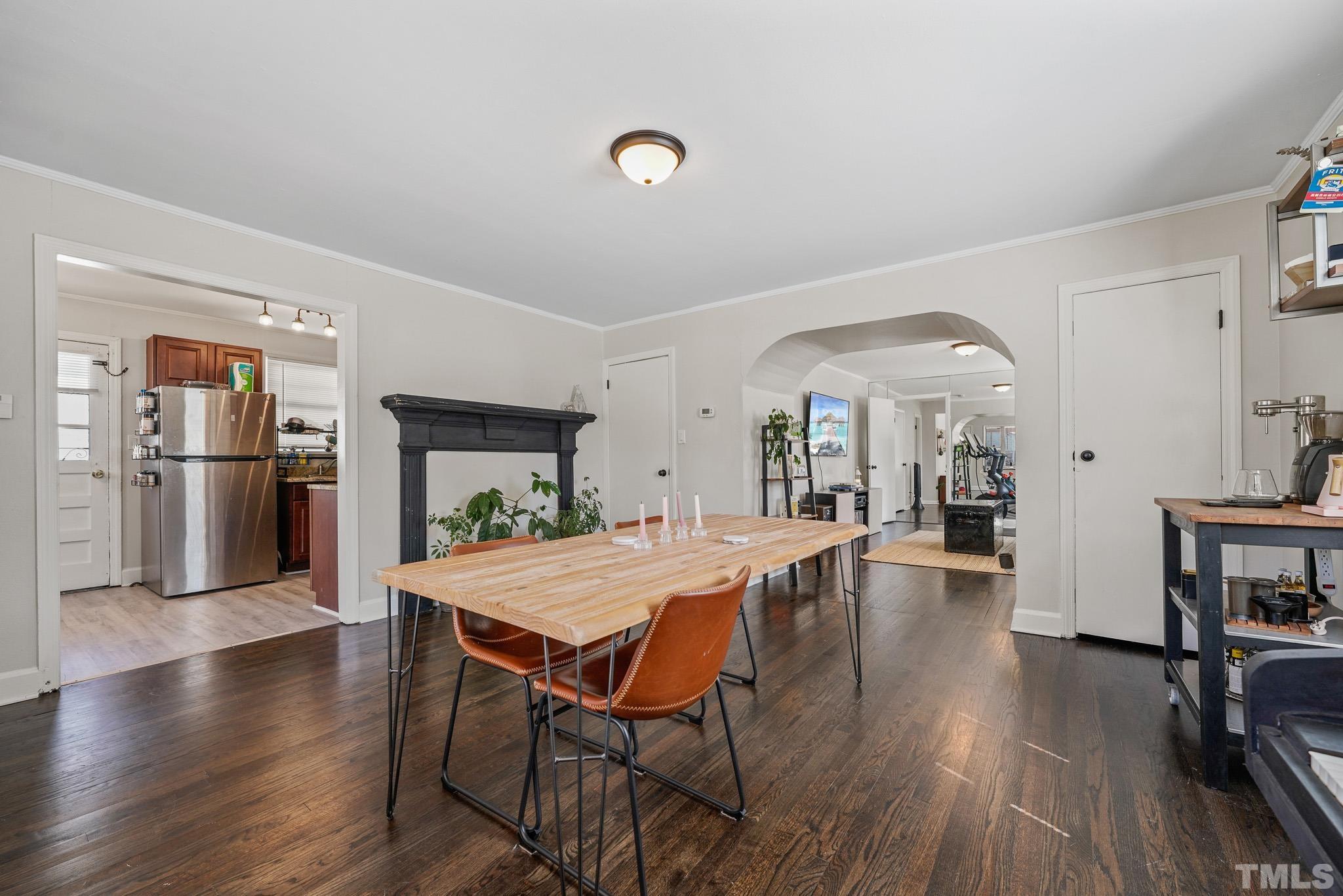 625 Coleman Street Raleigh, NC 27610 - Photo 6 of 22 a view of a dining room with furniture and wooden floor